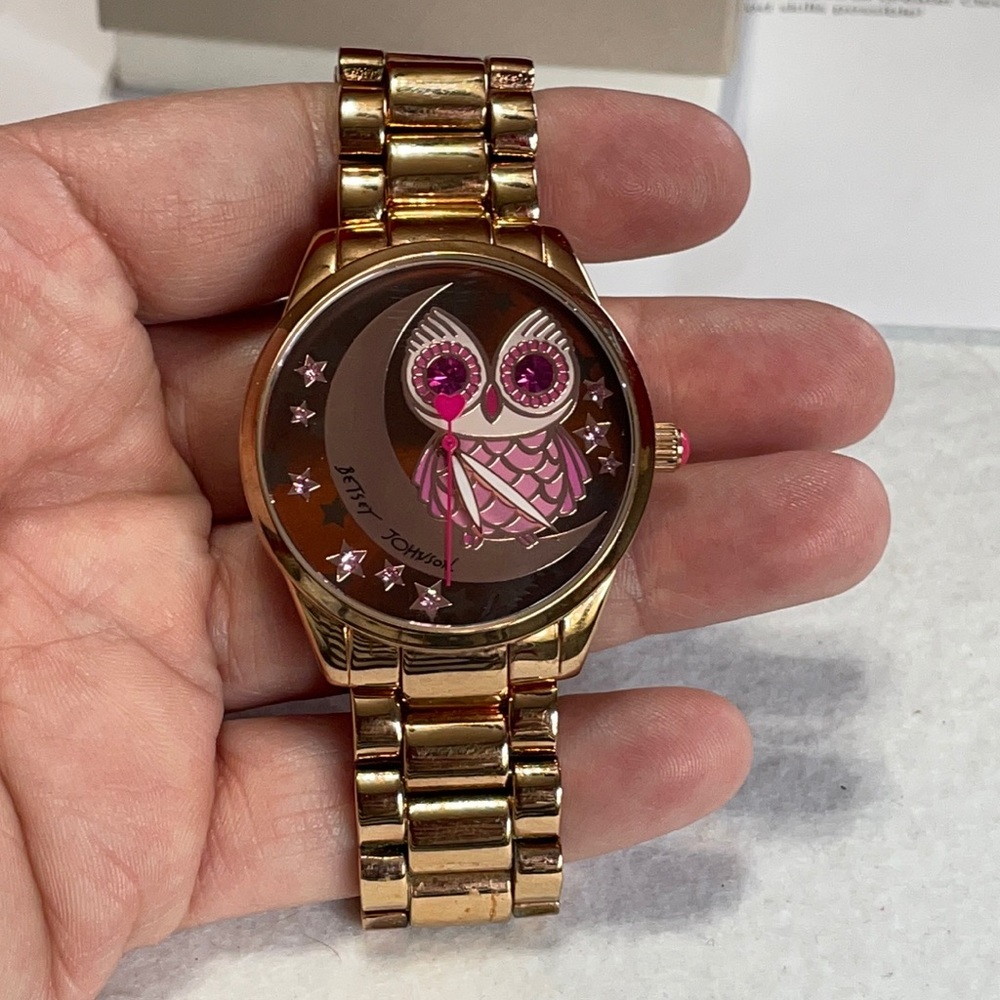 Betsey Johnson large face rose gold tone watch with a bright pink owl face